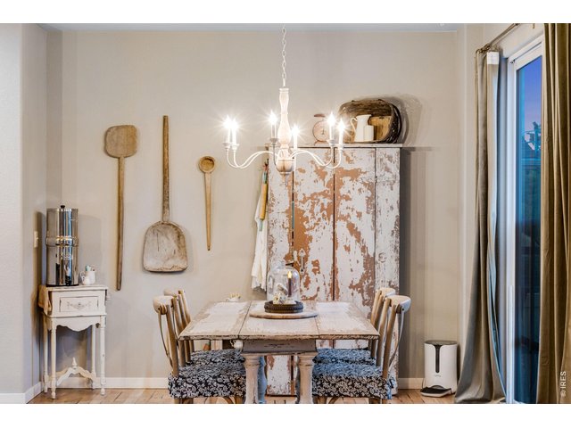 Property Photo 14 Large breakfast nook and dining area with chandelier 