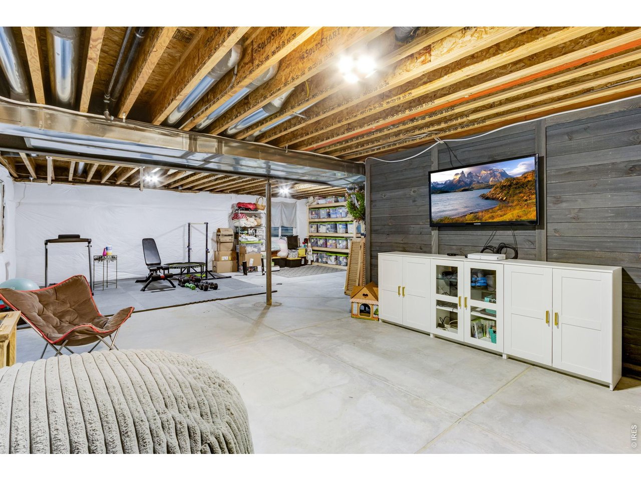 Partially finished basement with 8' ceilings. Enjoy this entertaining area or the corner gym