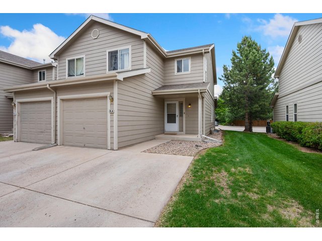 Property Photo 1 Welcome to 1637 Westbridge unit B4, an end-unit with two coveted driveway spaces!