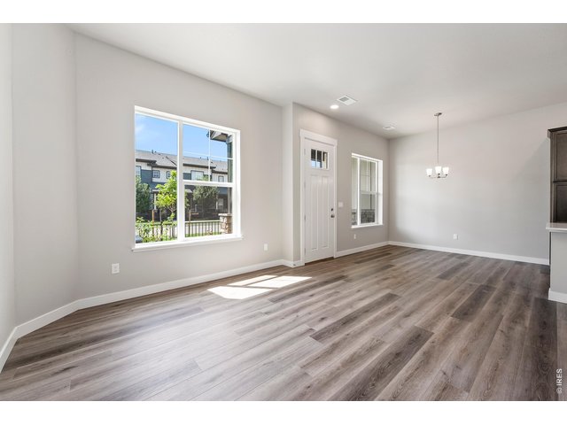 Property Photo 11 Luxury vinyl extended into the living room