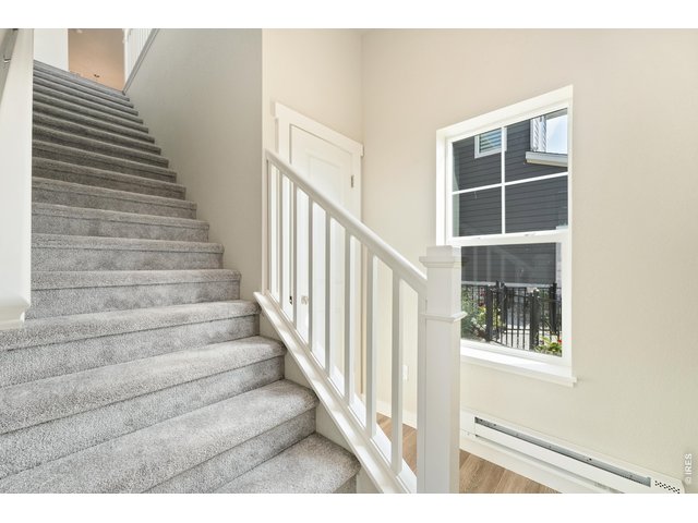 Property Photo 22 Stairs from attached garage to your ranch style condo! 
