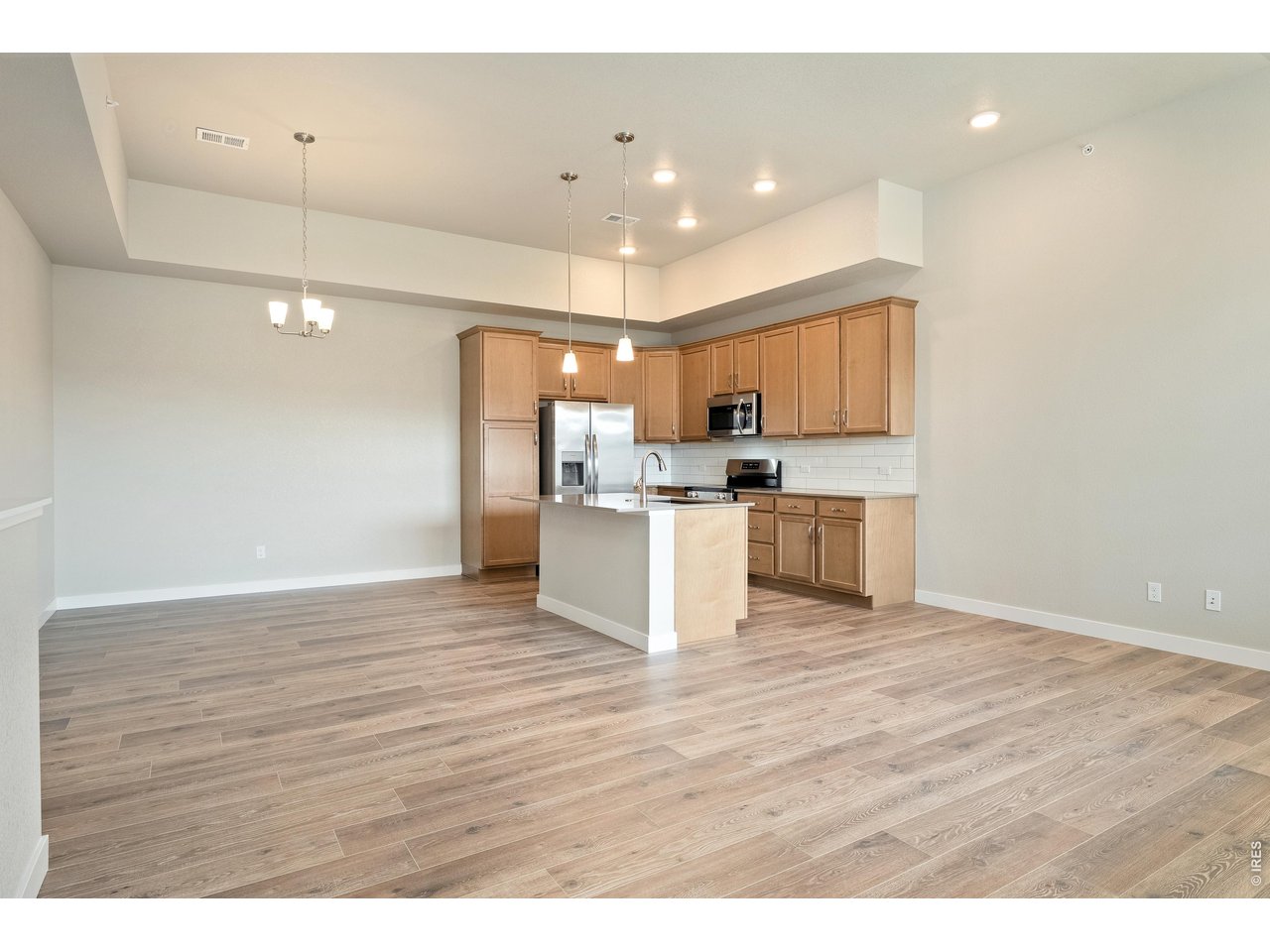 Property Photo 5 Open kitchen, with dining nook and large living room