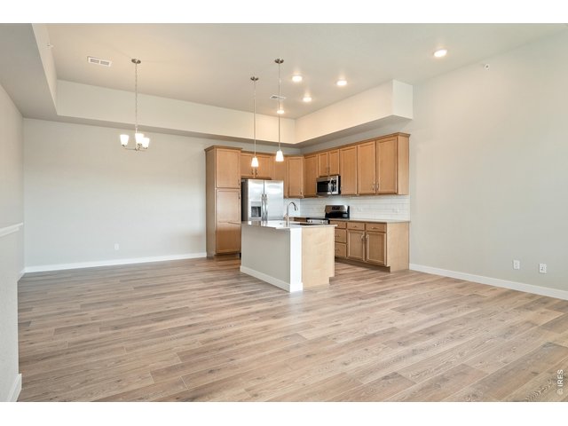 Property Photo 5 Open kitchen, with dining nook and large living room
