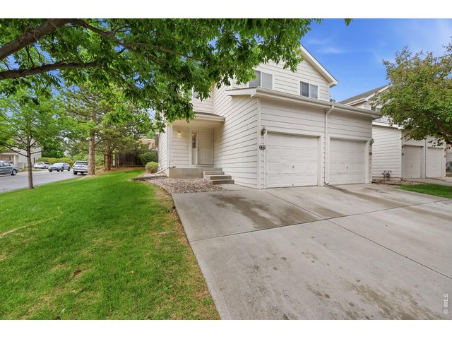 Property Photo 1 End unit on the corner with two coveted driveway spaces