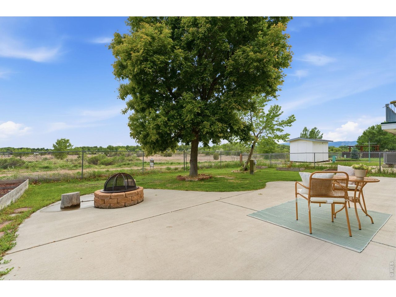 Huge concrete patio w/ fire-pit and backing to Riverbend Ponds Natural Area