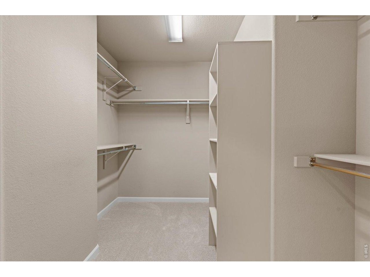Walk in closet off primary bedroom