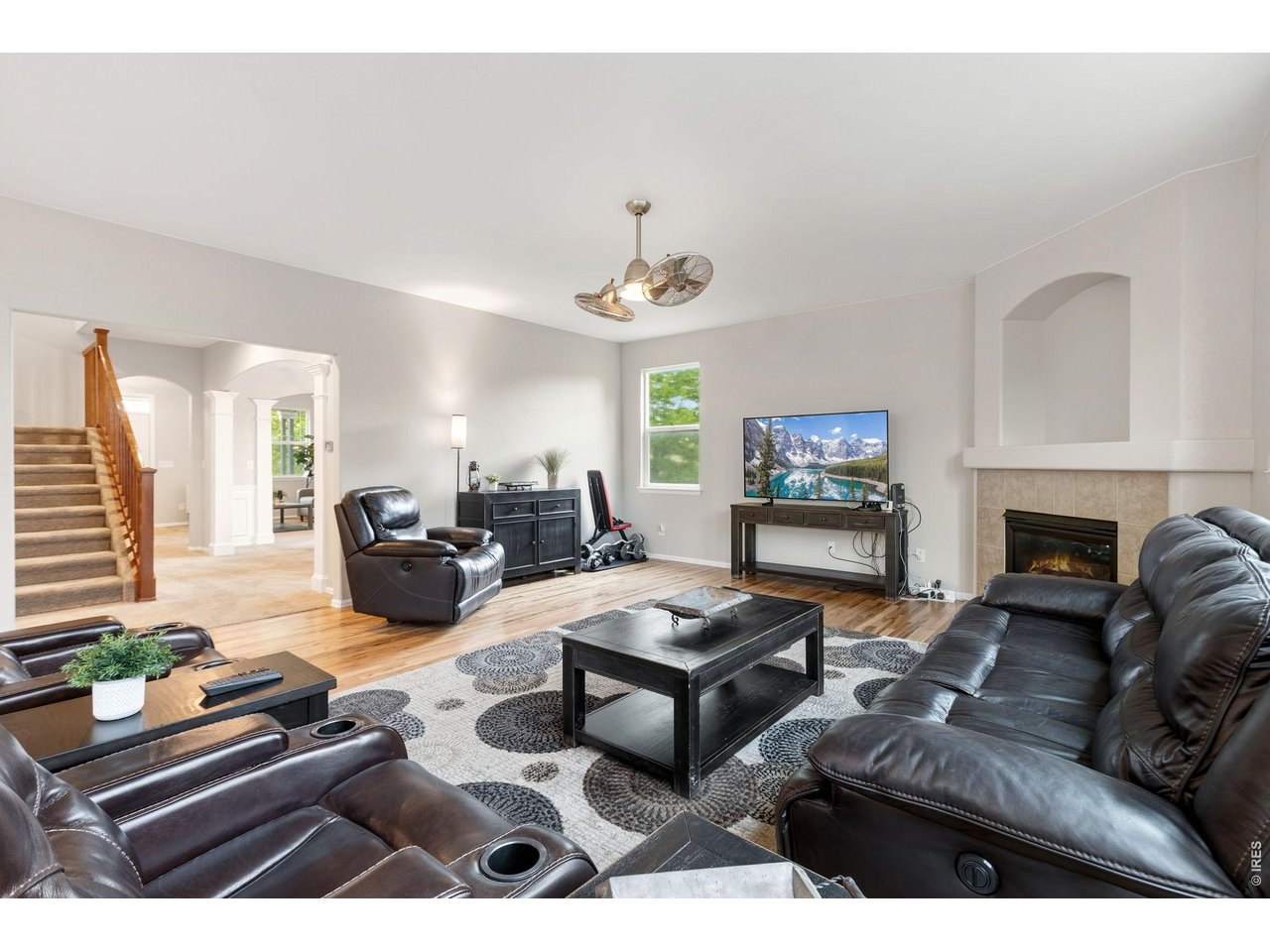 Open, bright and beautiful refinished hardwood floors
