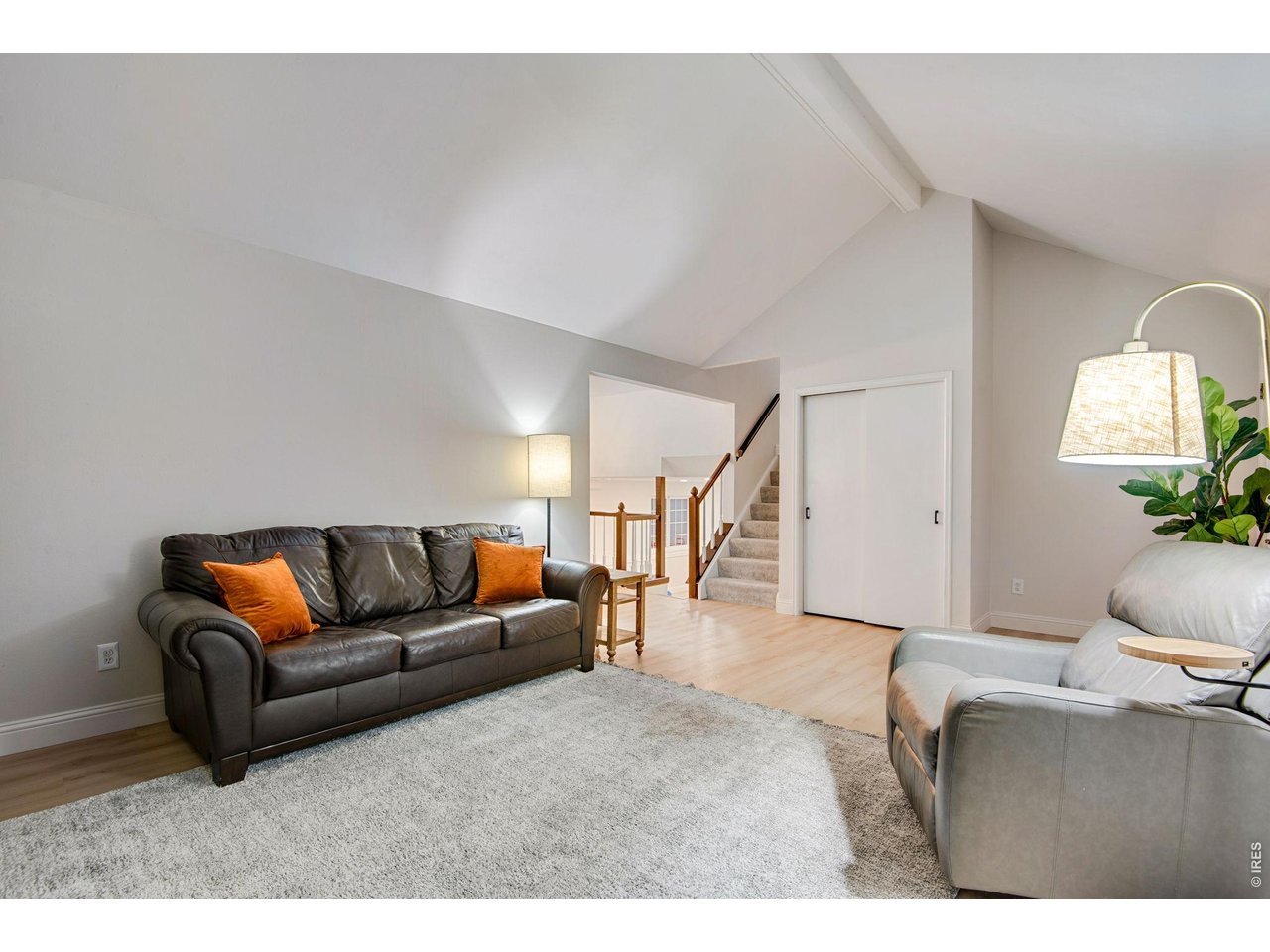 4 living spaces: this front living room, a family room, rec room and a great room.