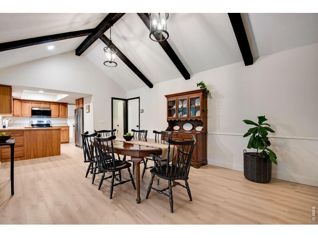 Property Photo 12 Open and bright family room. Table can easily be moved to the dining area