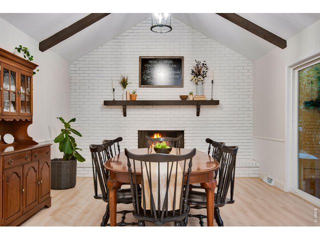 Property Photo 14 Full brick backsplash, wood burning fireplace and a wide mantel