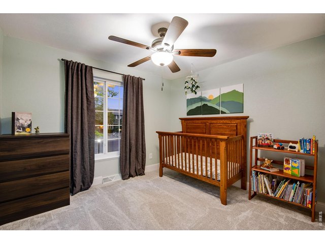 Property Photo 30 Bed 3 of 3 up features a ceiling fan
