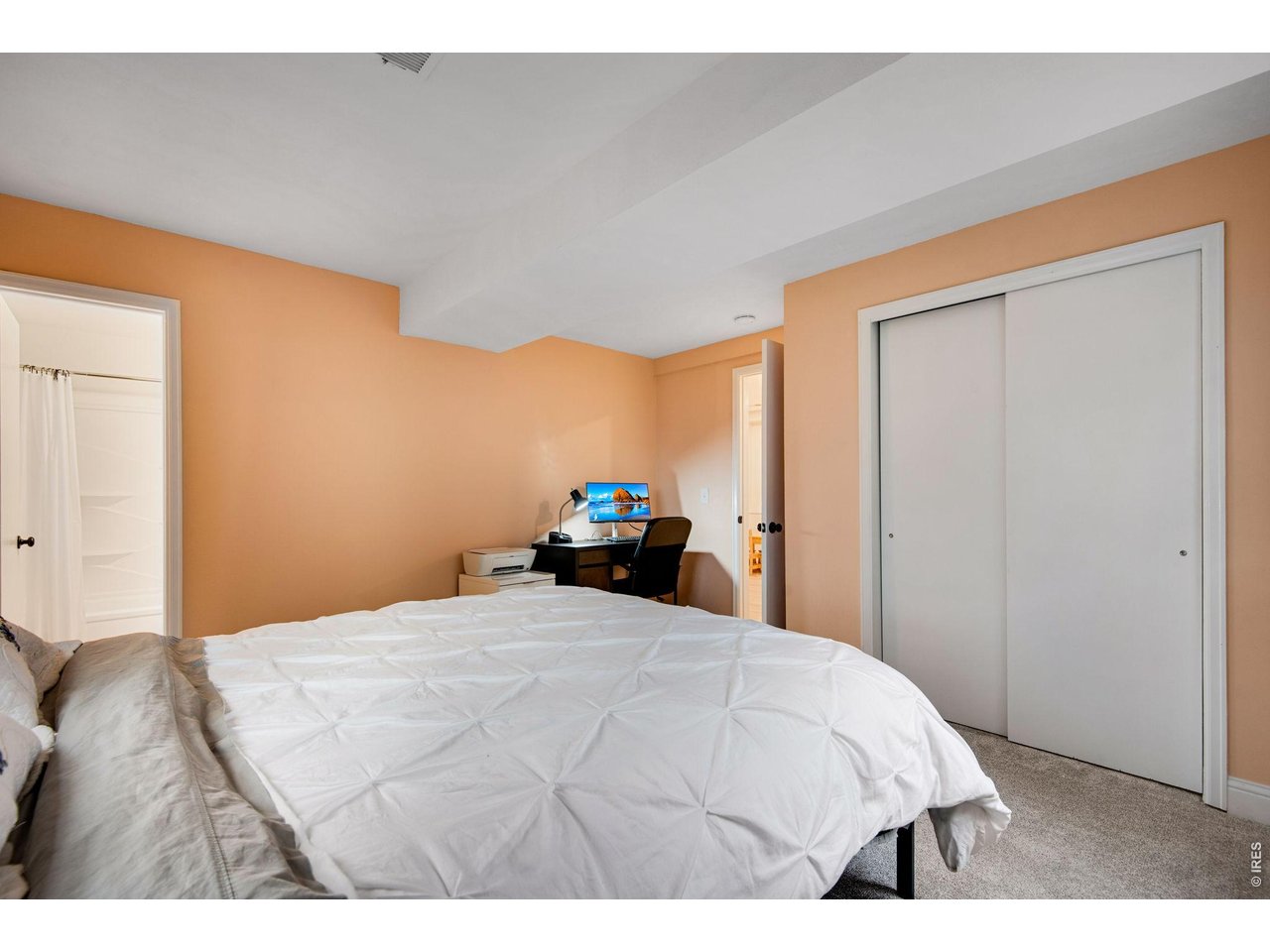 Lower level guest suite or in-law quarters. Located off the lower level living room with a private full bath and the laundry room