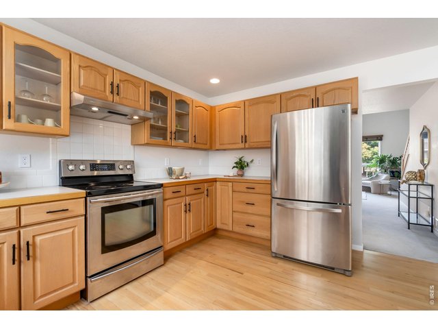 Property Photo 12 Well-Appointed Kitchen with Stainless Steel Appliances