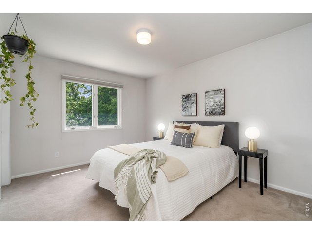 Property Photo 24 Spacious Secondary Bedroom with Natural Light