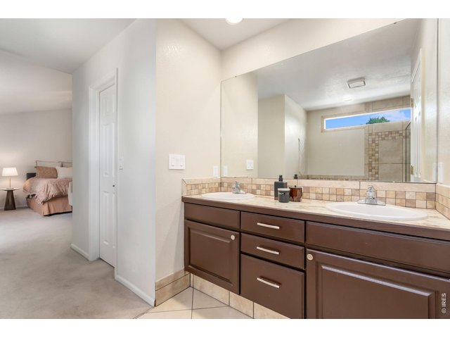 Property Photo 29 Luxurious Primary Bath with Dual-Sink Vanity