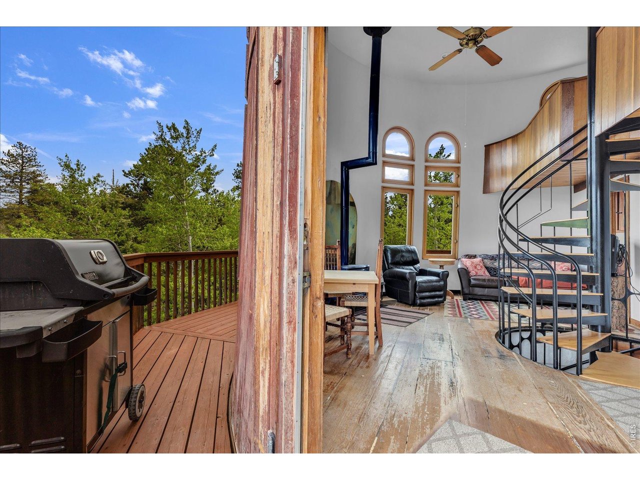 upper level living room and wrap-around deck