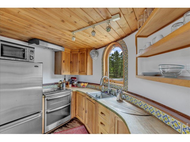 Property Photo 9 upper level kitchen