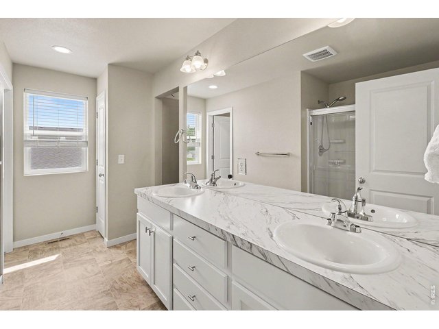 Property Photo 22 Beautiful Full Primary Bath with Large Walk-In Closet