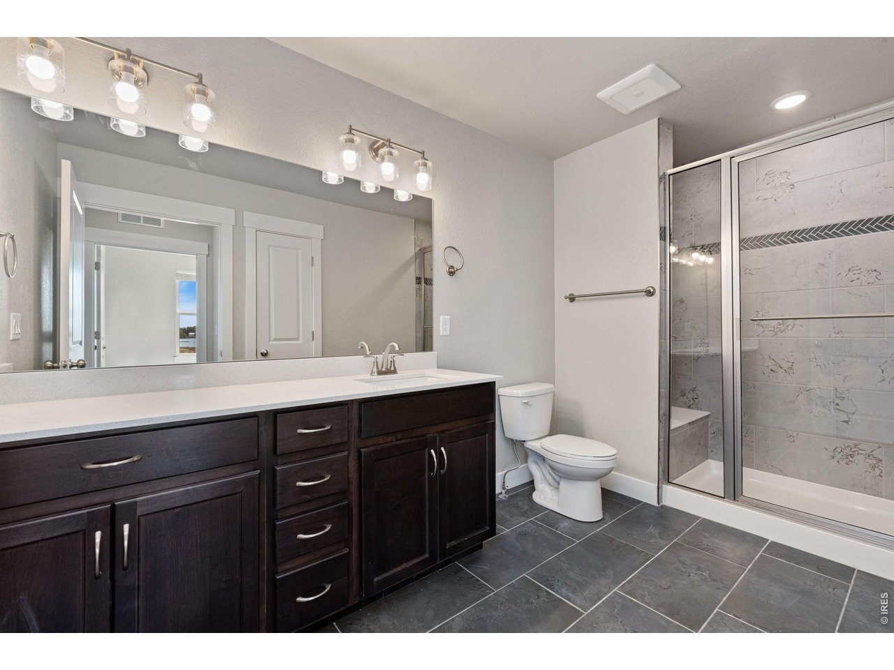 Property Photo 8 Primary bathroom with designer finishes