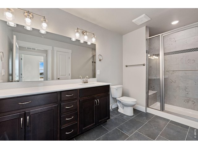 Property Photo 8 Primary bathroom with designer finishes