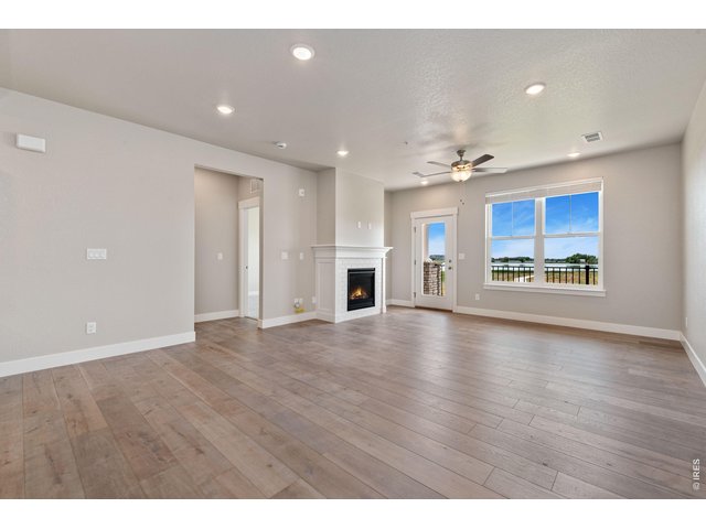 Property Photo 4 Luxury vinyl extended into the living room 