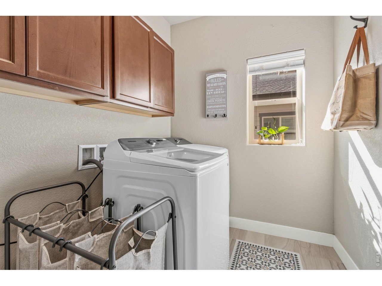 Property Photo 39 Separate laundry room with space for a utility sink and ample storage.