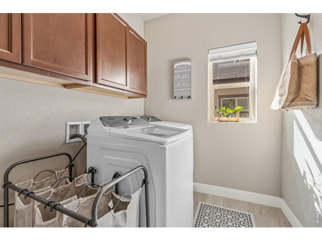 Property Photo 39 Separate laundry room with space for a utility sink and ample storage.