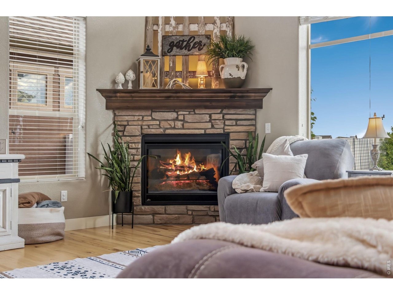 Property Photo 12 Cozy gas fireplace creates a warm and inviting gathering space.
