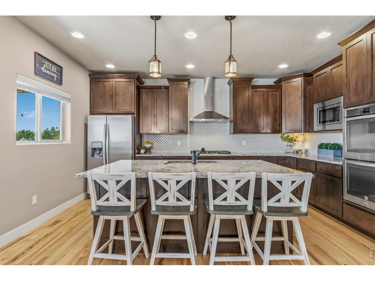 Property Photo 19 Beautiful "Cityscape" Tharp alder cabinetry with soft-close drawers and doors.