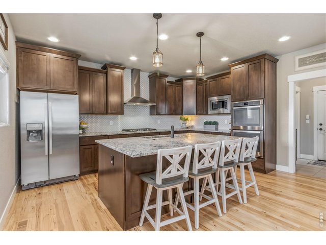 Property Photo 18 Spacious gourmet kitchen designed with both function and style in mind.