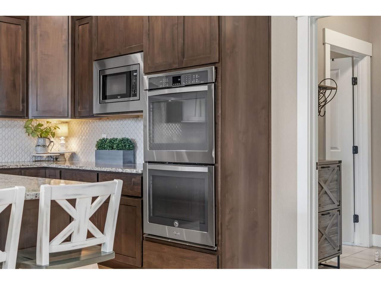 Property Photo 21 Stainless steel appliances including a double oven making entertaining and holiday cooking a breeze.