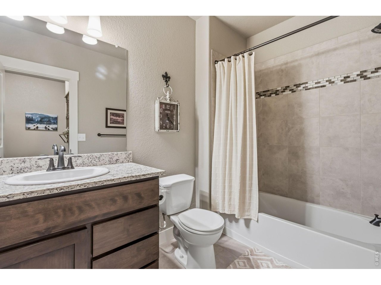 Property Photo 38 Full basement bathroom serves both lower-level bedrooms.