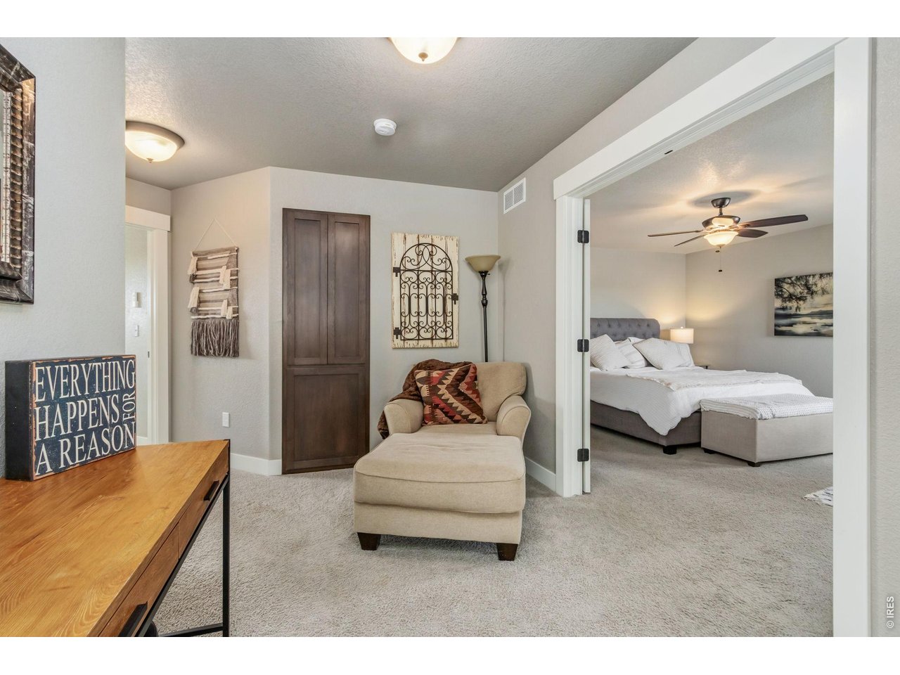 Property Photo 23 Open upper-level landing with additional storage and linen closet.