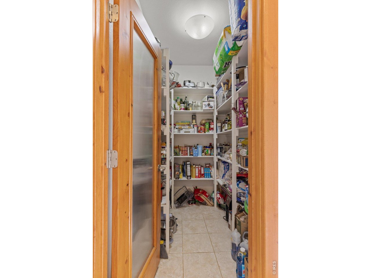 Large and well organized walk-in pantry.