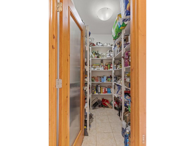 Property Photo 12 Large and well organized walk-in pantry.