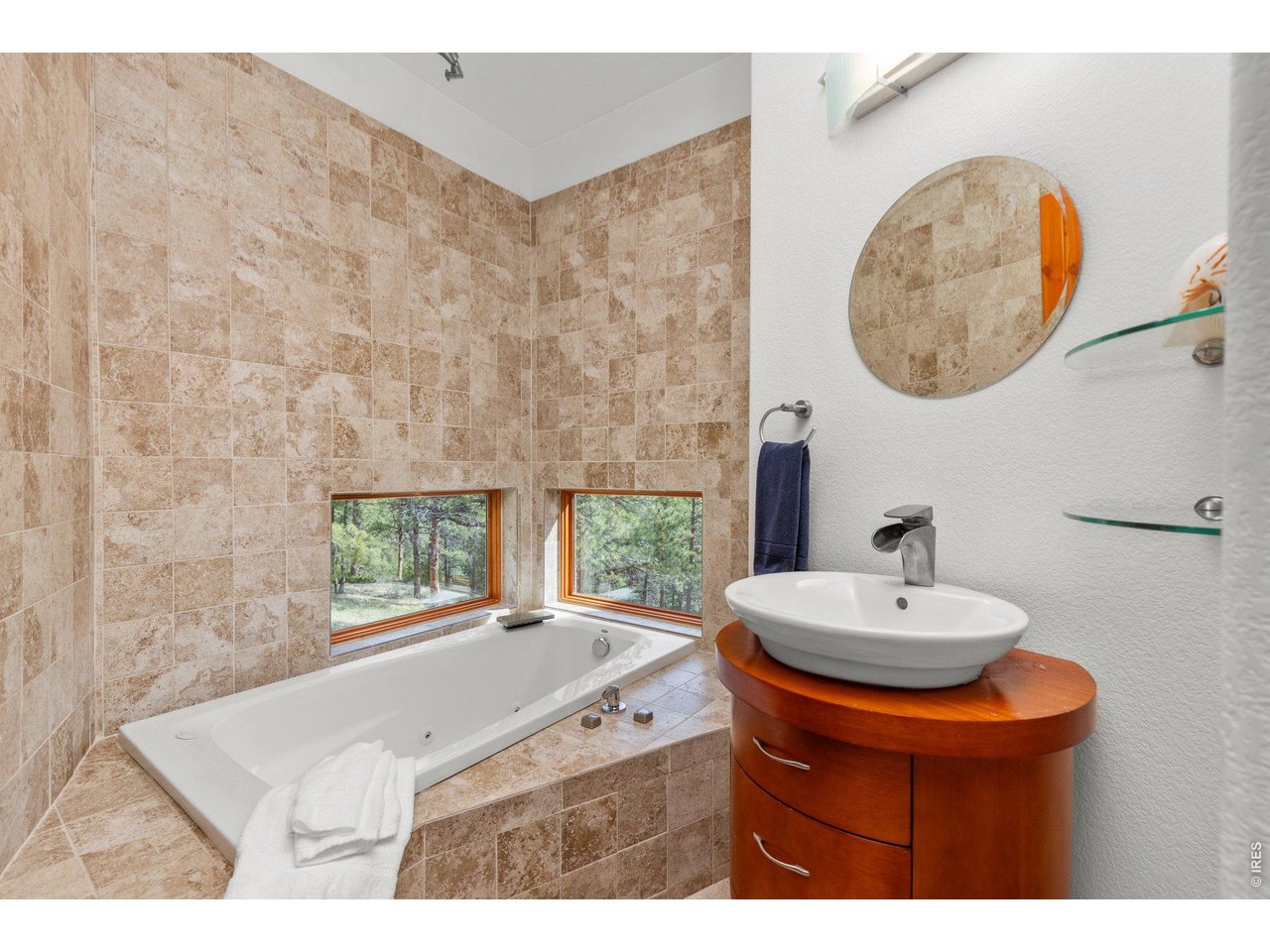 Spa-like Bathroom attached to the second main floor bedroom.