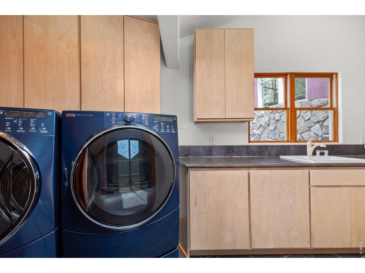 Large laundry room off Primary Suite