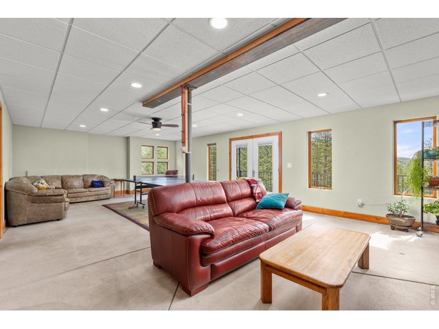 Property Photo 27 Walk-out Basement space is partially finished as a Recreation Room