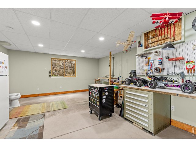 Property Photo 28 Large Hobby/Workshop Space in the Walk-out Basement