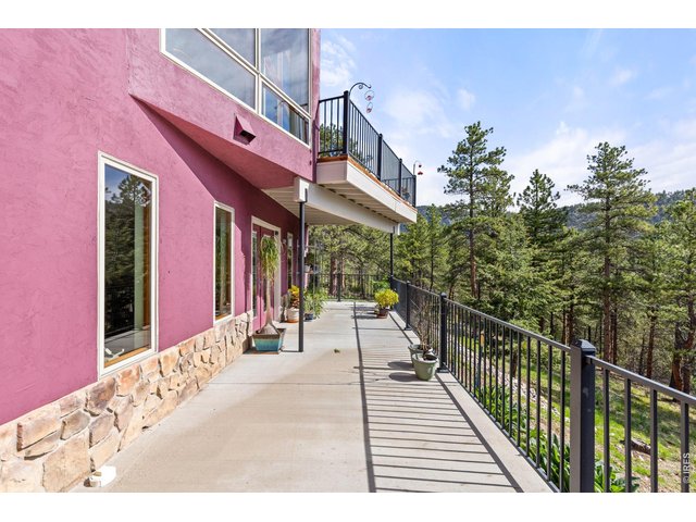 Property Photo 31 Back walkways and patio space
