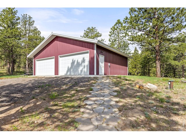 Property Photo 34 Plus Additional Nearly New 4 Car Garage/Outbuilding with 1,140 square feet of additional space!