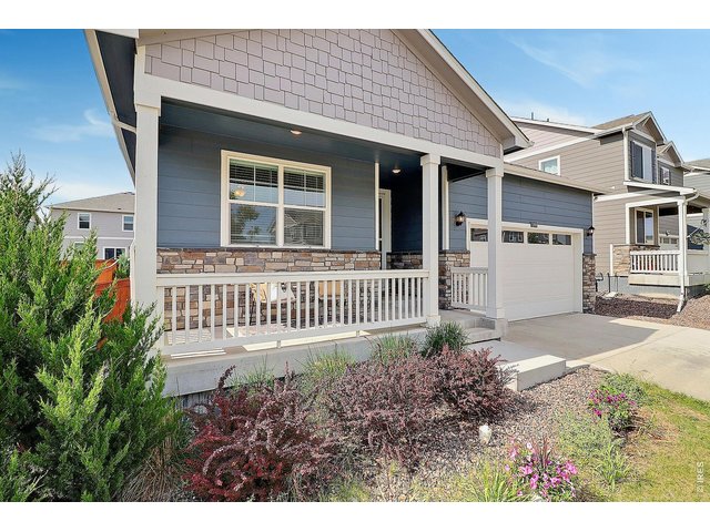 Property Photo 3 Covered front porch with welcoming entry