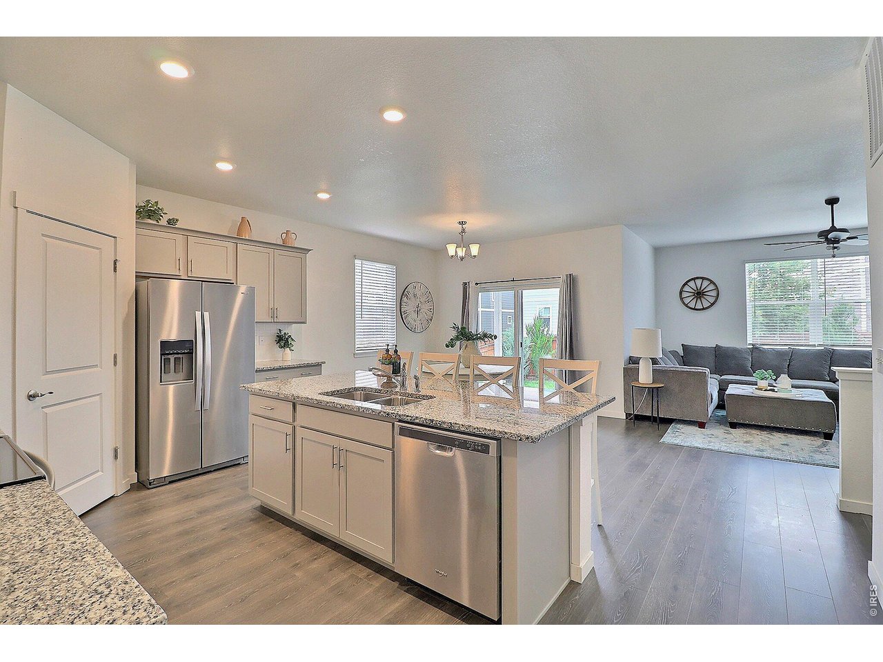 Property Photo 12 Kitchen open to living area, nice and bright