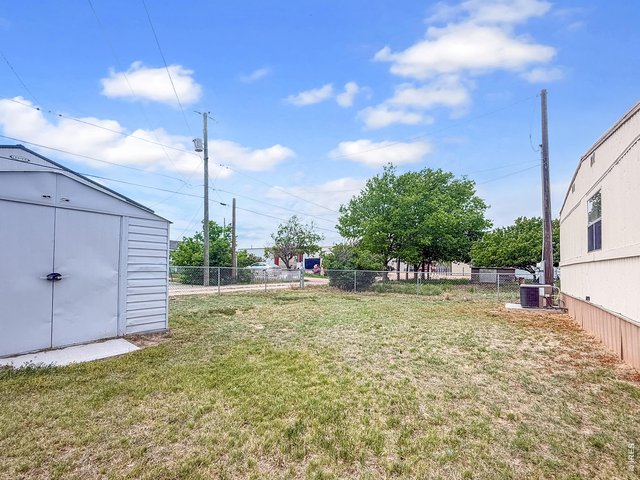 Property Photo 47 907 back yard looking to alley