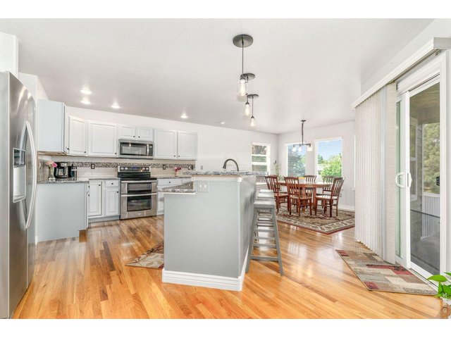 Property Photo 6 Recently updated kitchen has granite counters, plenty of prep space, stainless steel appliances.