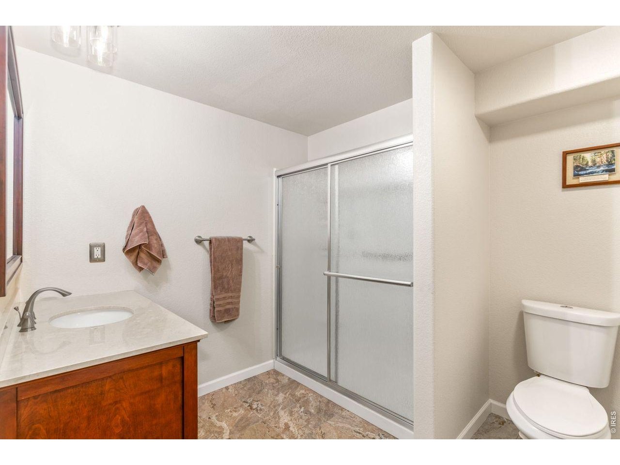 Large bathroom in basement with walk in shower