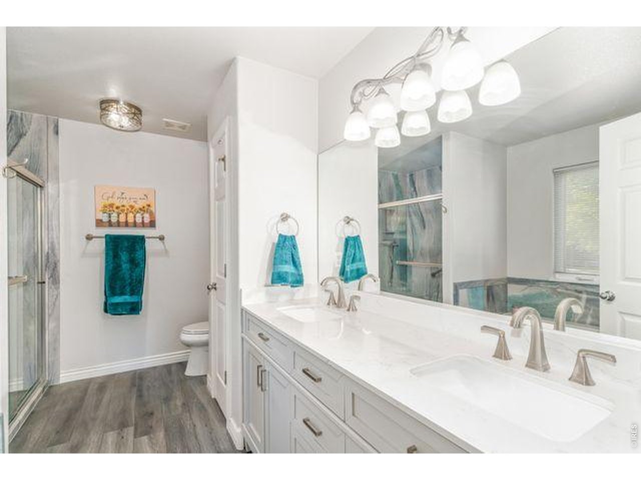 5 piece en suite is newly renovated with updated lighting, granite counters, dual sinks, LVP flooring, walk in shower a large soaking tub. 