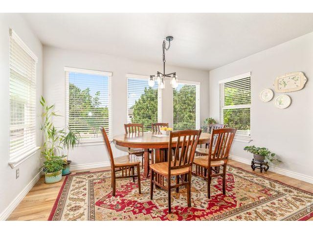 Property Photo 9 Large dining space in right in the kitchen looking out over your beautiful back yard