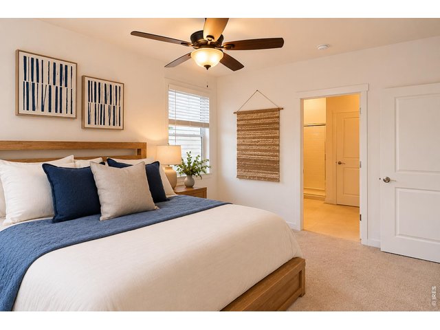 Property Photo 22 Primary suite-photo virtually enhanced