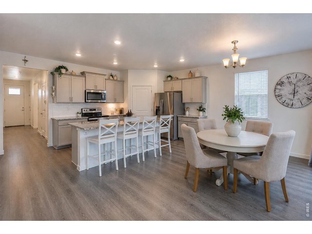 Property Photo 14 Kitchen and dining area-photo virtually enhanced